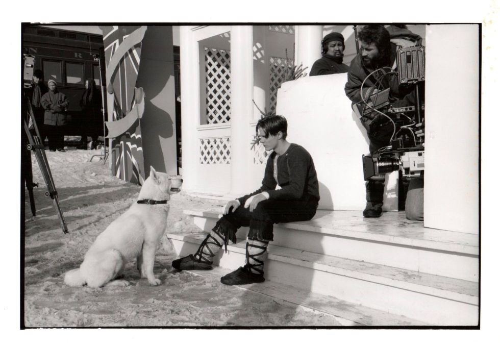 Black and white photo with dog and trainer