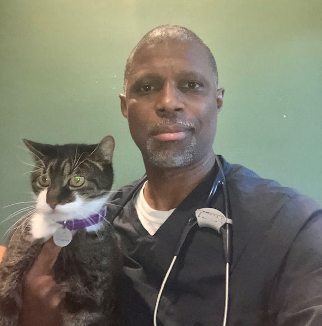 Dr. Alex Parisien holding a cat